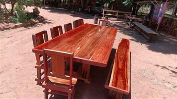 12 sitplek tafel en stoele en bankie R13500