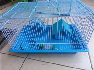 Hamster cage with accessories 