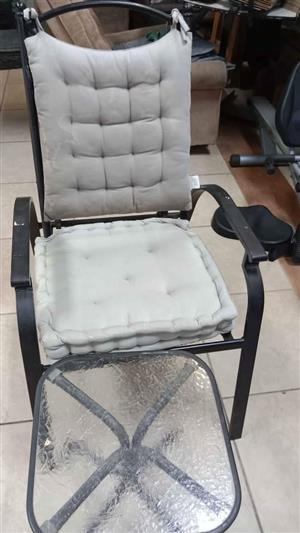 Steel stackable chair with a small table