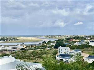 Prime Erf for Sale in Stilbaai West – Breathtaking Ocean & River Views!