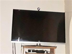 JVC 49 smart LED TV with swing arm bracket 