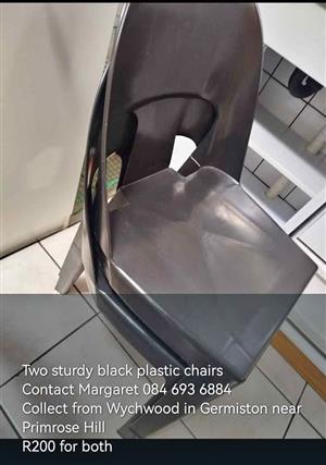 Black plastic chairs x 2