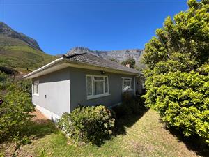 A Warm, Character-Filled Home with Garden & Mountain Backdrop