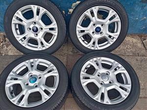 Original set of 15 inch Ford fiesta & figo mag wheels with tyres for sell 