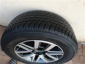18inch Toyota Hilux/Fortuner OEM mag with used 265/60/18 tyre to use for spare w
