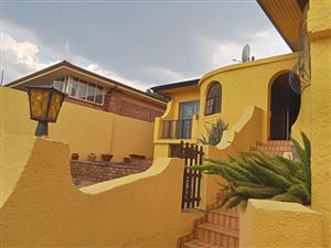 Charming Kensington Retreat with Timeless Views