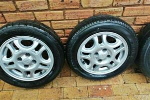 Bargain Opel 14 inch rims and tyres