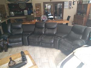4 seated Black lounge suite with 2 Consoles 