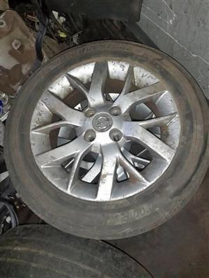 NISSAN ALMERA RIMS AND TYERS 