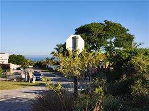 890 m² Corner-Level Stand with Distant Sea View – Prime Opportunity