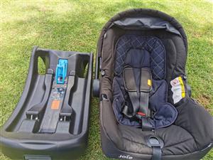 Joie car seat with detachable base.