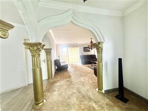 Spacious 4-Bedroom Family Home with Study, 3 Garages & Entertainment Patio