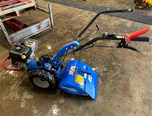 USED WALK-BEHIND GARDEN TILLER