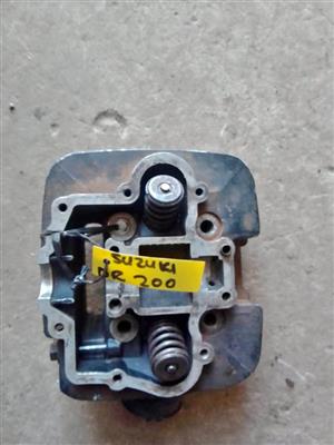 Suzuki DR 200 cylinder head. Meyerton bike scrapyard new and secondhand spares.