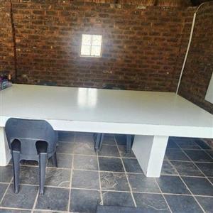 Two large outdoor patio tables