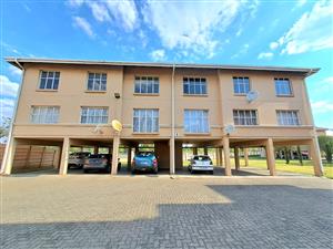 Neat, move-in ready townhouse for sale in secure complex with lots of extras