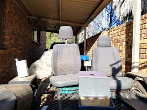 Landrover Defender front seats and centre concolee