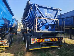 Tri axle twin bin side tipper trailer