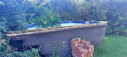 Swimming pool fiberglass shell and brand new pool pump never been used for sale. Selling as a set.