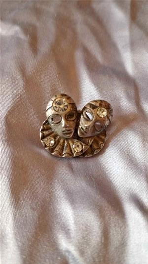 vintage-style silver-tone double Venetian mask brooch with crystals.