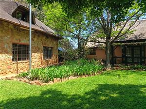 Lush 12ha Farm For Sale Near Buffelspoort – With River, Views & Rental Income