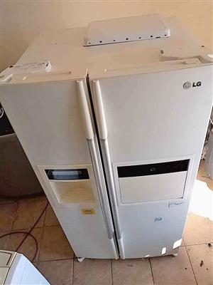 Original LG frost free side by side fridge with ice and water dispenser