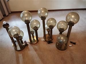 4 x floor lamps,plates brass with glass ball shades.