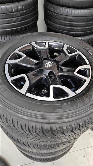 Toyota Legend 50 original 18inch mags with good used 265/60/18 Dunlop grandtrek AT25 