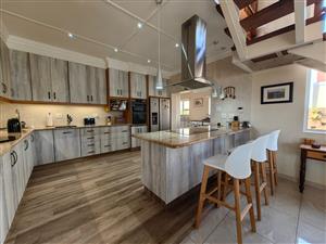 Exquisite Coastal Living: State-of-the-Art Home with Breathtaking Sea Views