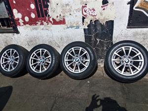 Original set of 16 inch BMW standard mags with tyres for sell