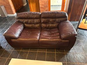 Brown leather lounge suite 