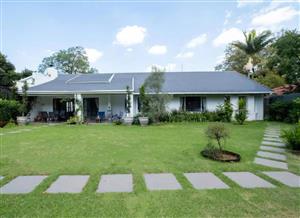 This charming fully furnished house with a separate cottage is located at 24a 12th Avenue, Parktown