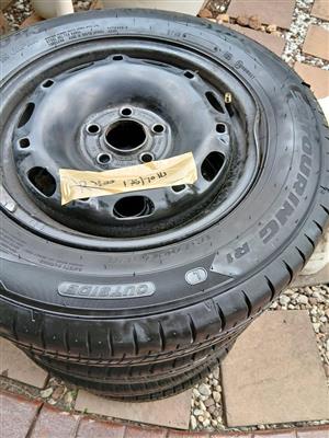 4x 14 inh polo Tyres and rims 75%
