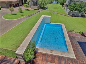 Executive estate living on the Vaal River. Masterly built. Elegant décor and finishes.