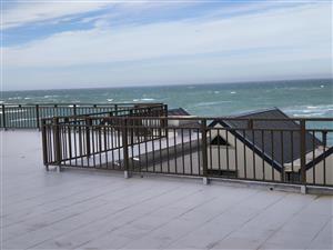 Spacious 12-Bedroom Beachside Home with Stunning Sea Views