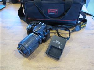 Nikon D3100 SLR with 55-200mm VR lens with Camera Bag