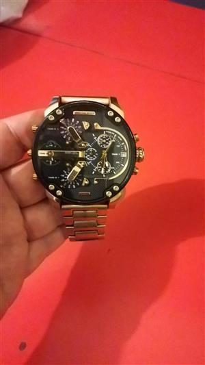 Diesel only the brave gold and black watch 