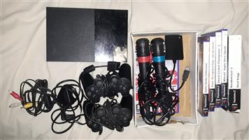 PS2 console and accessories 
