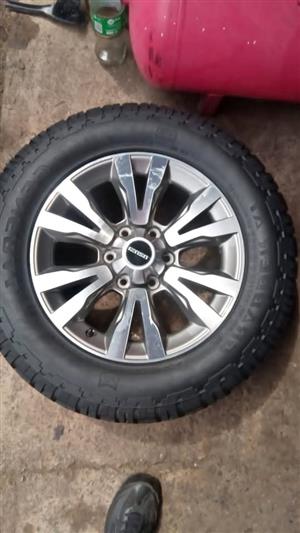18" Isuzu D-Max original mag with used 255/60/18 tyre to use for spare