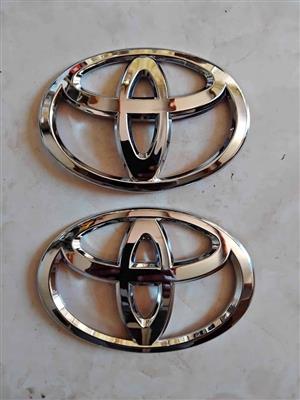 TOYOTA QUANTUM FRONT AND BACK BADGES. BRAND NEW FOR VARIOUS OTHER CARS TOO