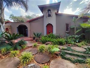 Tropical Oasis: Multiple Bedroom Home with Solar, Borehole & Luxury Entertainment Areas