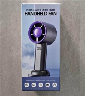 Handheld fan with phone holder for sale