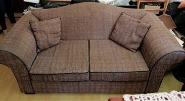 Two seater couches and wingback chairs