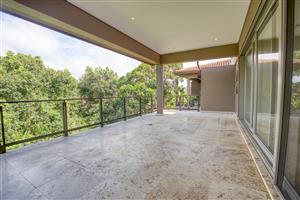 Modern Single-Level Condo with Forest Views – To Rent