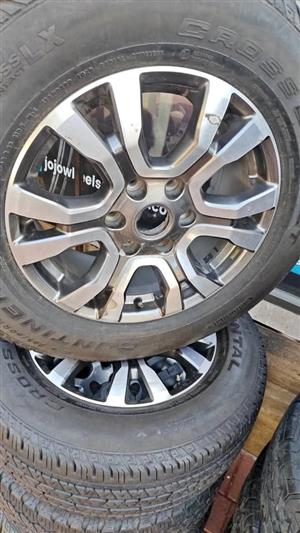 18inch Ford Ranger Wildtrack/Everest OEM mags with used 265/60/18 tyre to use for spare wheel 