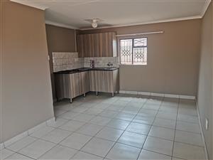 One bedroom apartment with open plan lounge and kitchen unit fitted