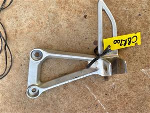 Honda CBR 300 footrest bracket. Meyerton bike scrapyard new and secondhand spares.