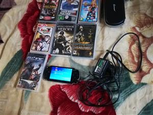 Sony Psp with included with 1 game of your choice system bundled
