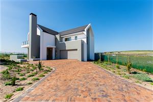 Turnkey Contemporary Living with Greenbelt & Farmland Views